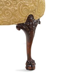 An Oversized George II Style Carved Walnut Slipper Chair