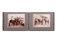 [NATIVE AMERICANS]. JONES, John Edward (1863-1922), photographer. Album containing 50 photographs of the San Carlos Indian Agency, including Apache civilians and police, agency buildings and dwellings, and scenic views. Ca 1904.