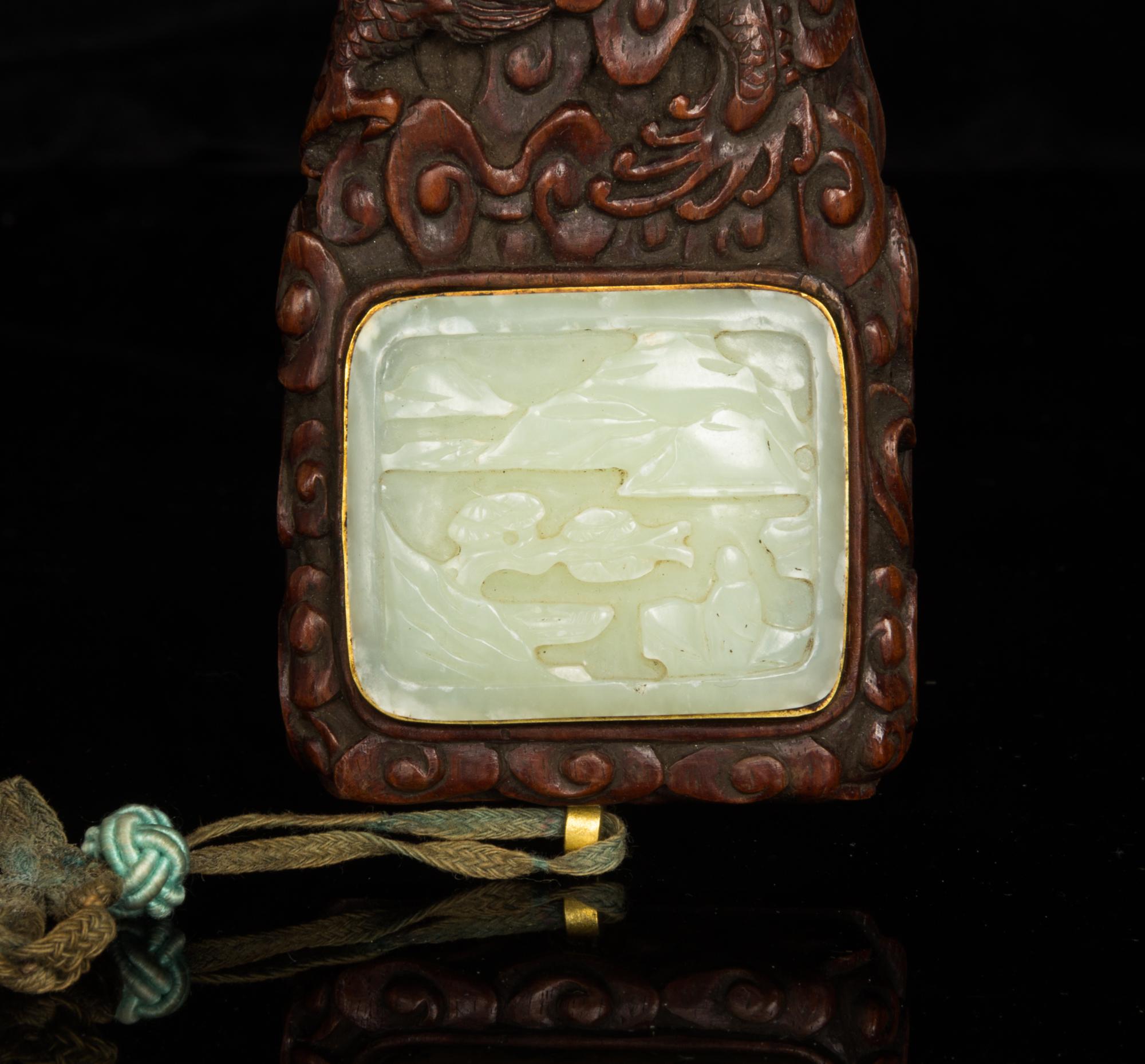 A Celadon Jade Inset Rosewood Ruyi Scepter Length 18 3/4 inches. — QING DYNASTY