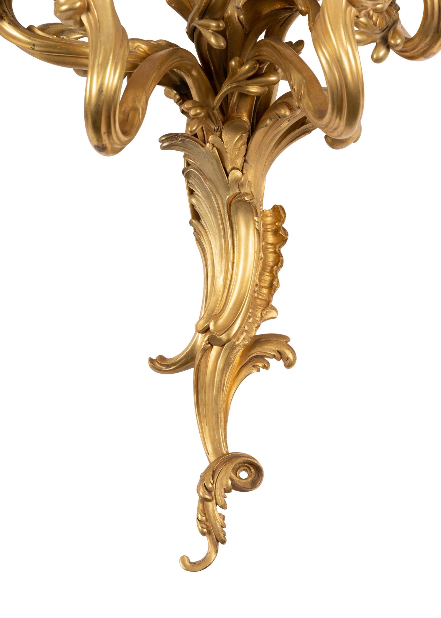 A Set of Four Louis XV Gilt Bronze Five-Light Sconces