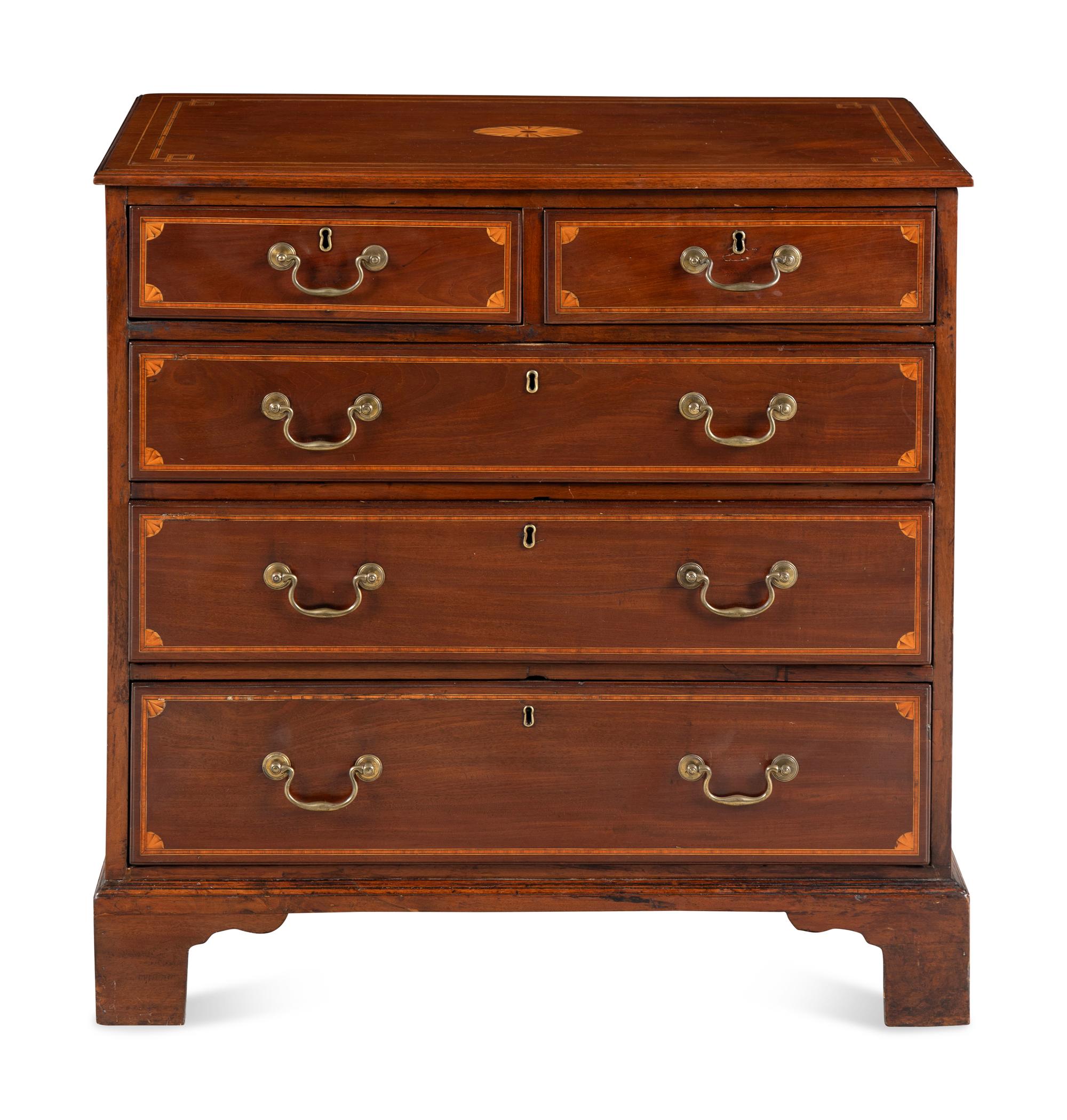 An English Mahogany and Marquetry Chest of Drawers