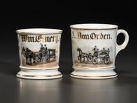 Two Porcelain Shaving Mugs Featuring Horse-Drawn Hearses