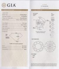 An 18 Karat Tricolor Gold, Fancy Yellow Diamond, Diamond and Colored Diamond Ring, 10.10 dwts.