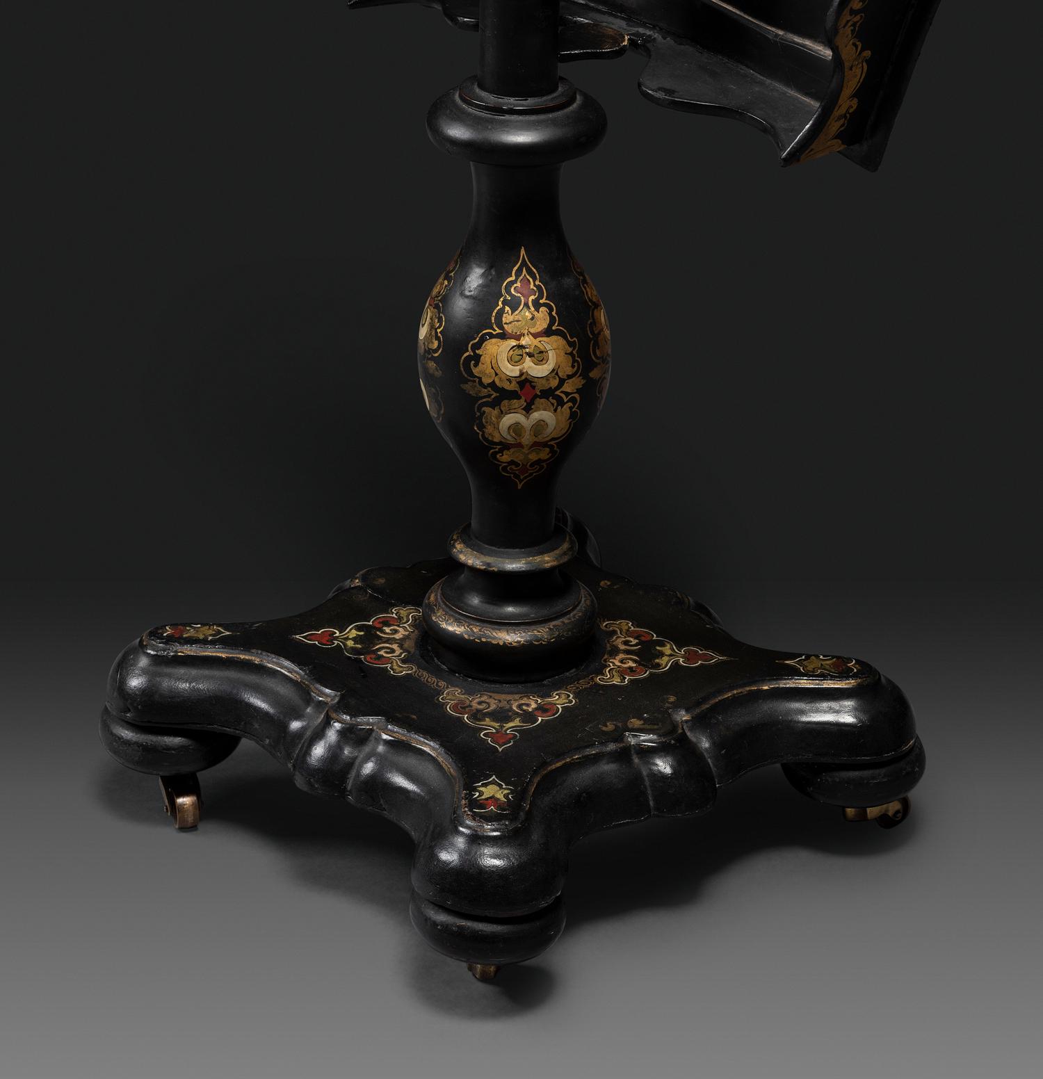 A Victorian Parcel-Gilt and Black Lacquered Mother-of-Pearl Inlaid Hexagonal Tilt-Top Tea Table