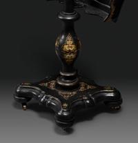 A Victorian Parcel-Gilt and Black Lacquered Mother-of-Pearl Inlaid Hexagonal Tilt-Top Tea Table