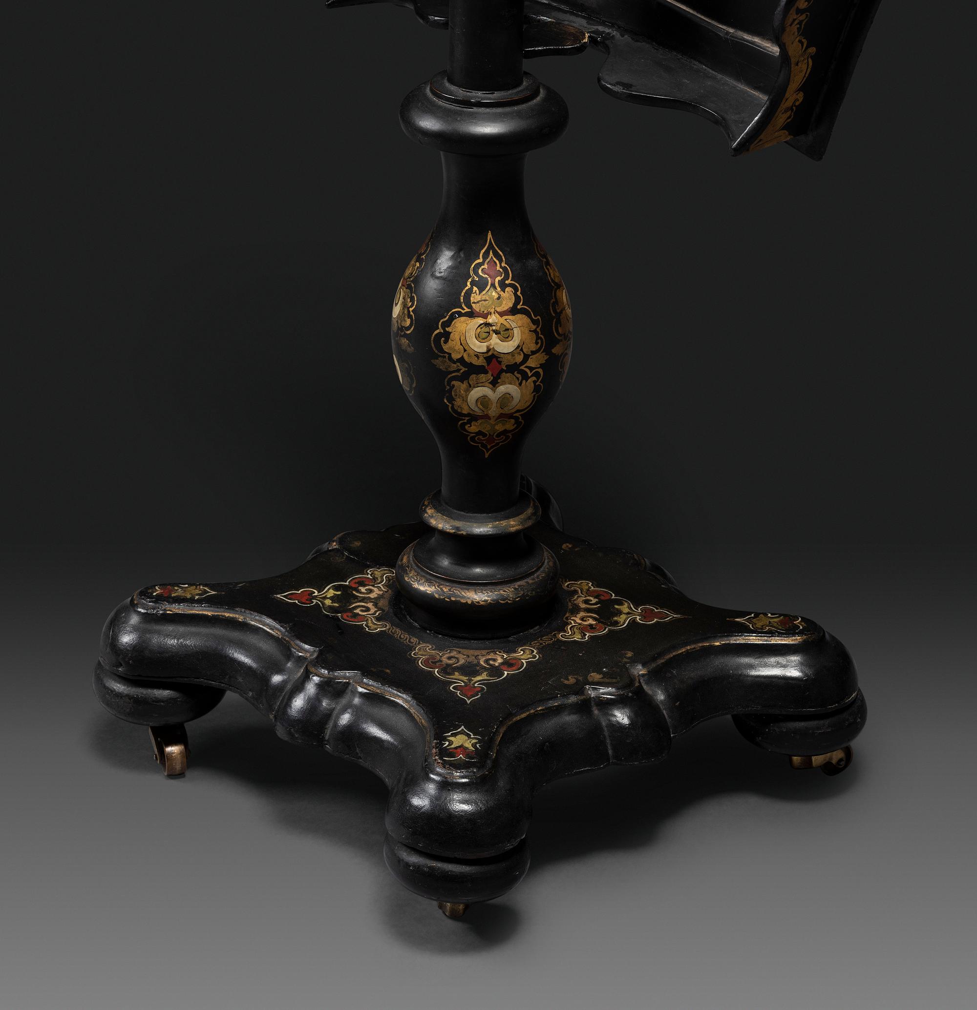 A Victorian Parcel-Gilt and Black Lacquered Mother-of-Pearl Inlaid Hexagonal Tilt-Top Tea Table