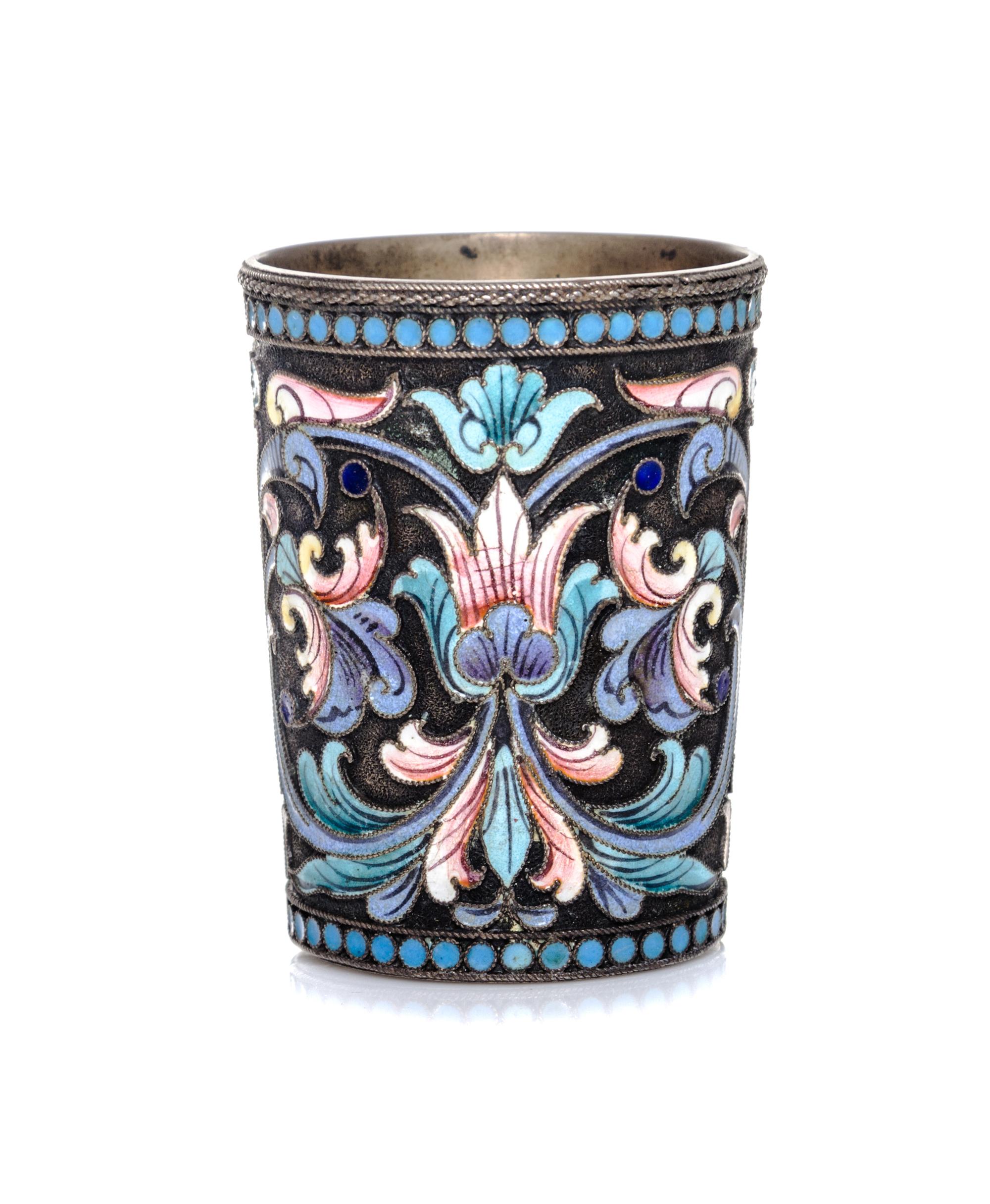A Russian Silver and Enamel Liquor Glass, Moscow, 1908-1926, having polychrome foliate decoration throughout.