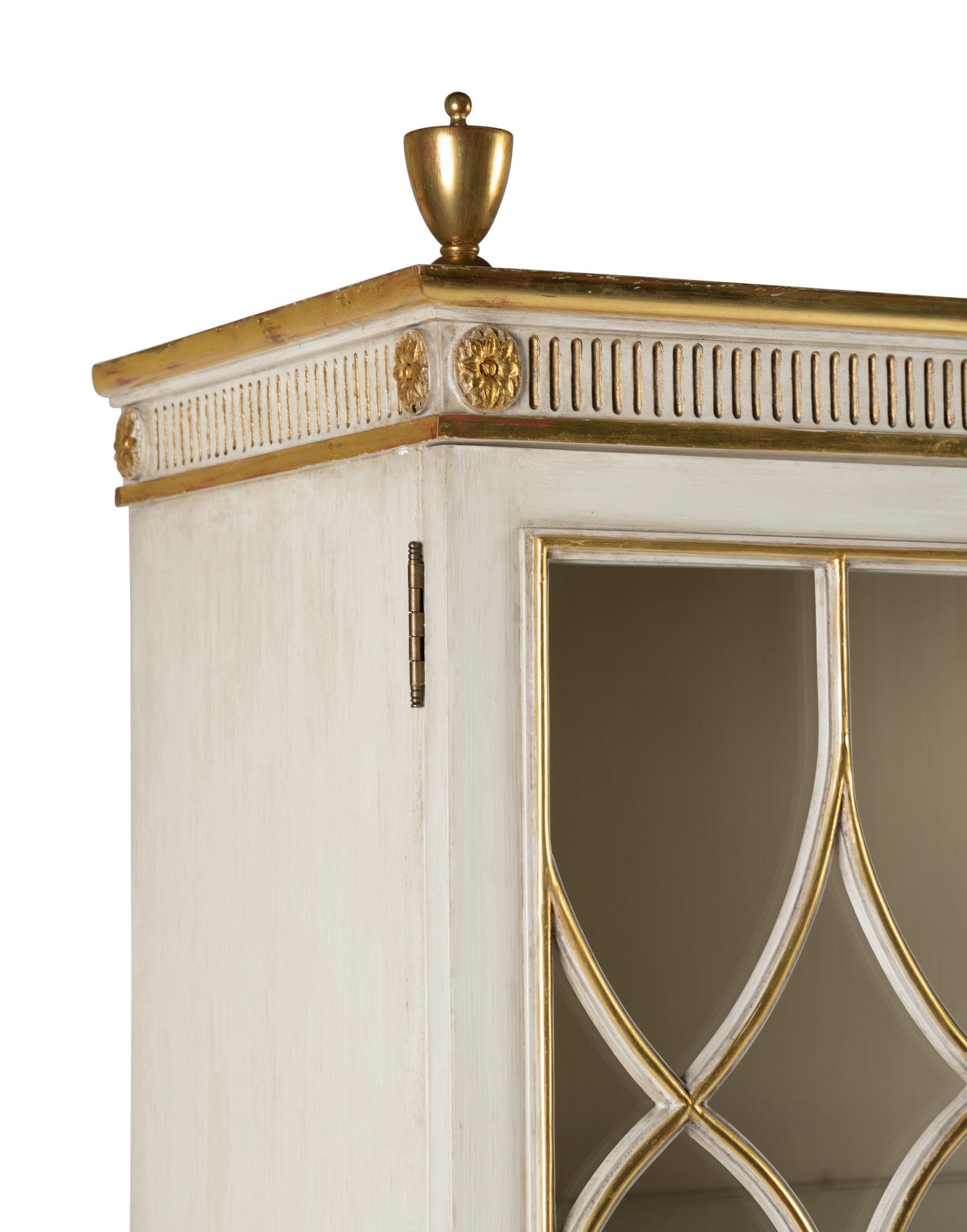 A Louis XVI Style Painted and Parcel Gilt Bookcase