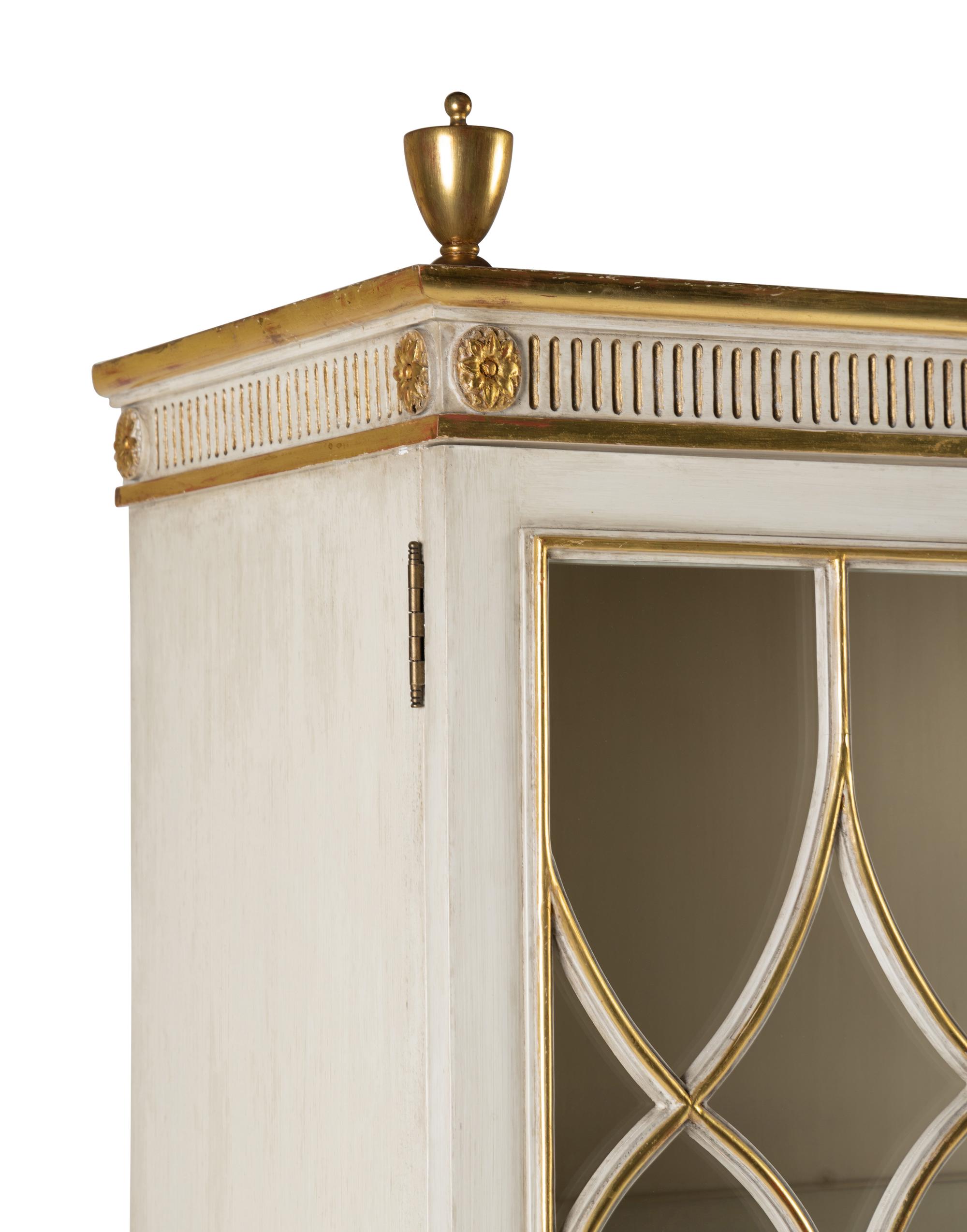 A Louis XVI Style Painted and Parcel Gilt Bookcase