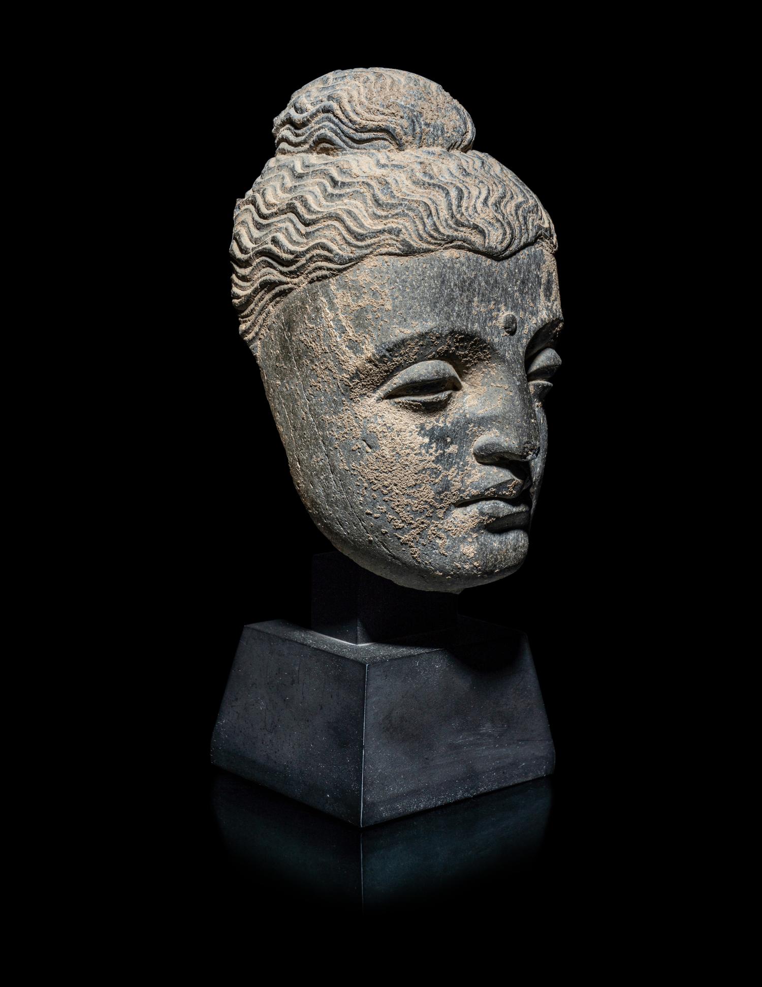 A Gandharan Grey Schist Head of Buddha