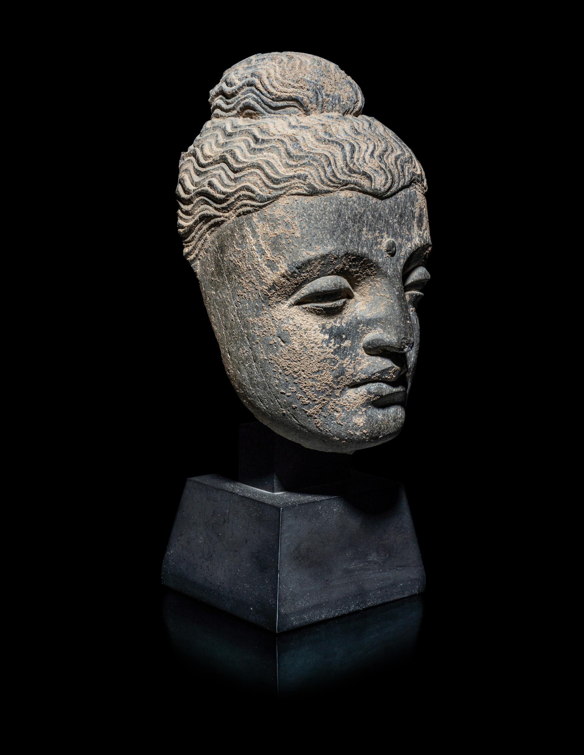 A Gandharan Grey Schist Head of Buddha