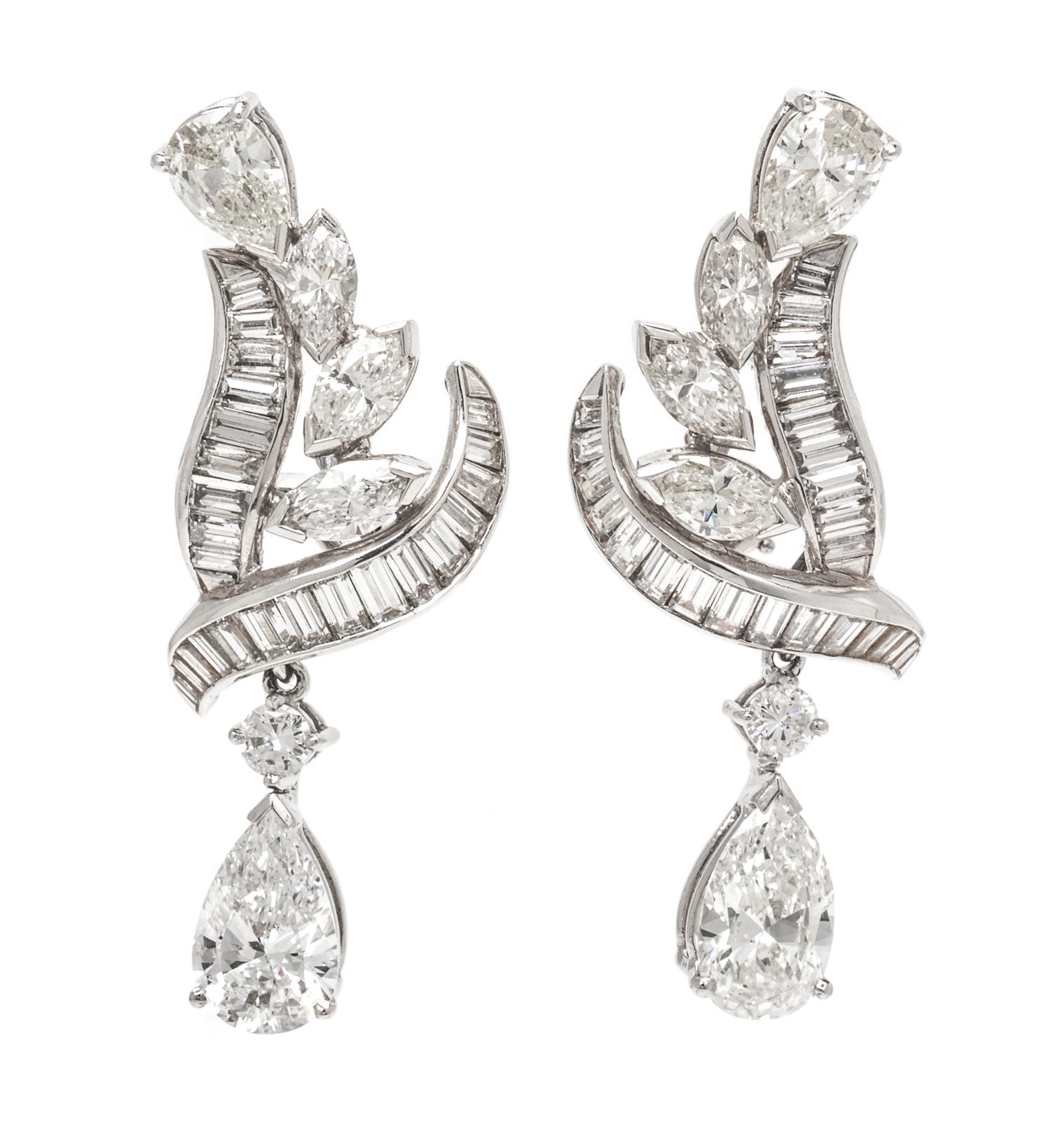 A Pair of Platinum and Diamond Convertible Day/Night Earclips, 9.00 dwts.