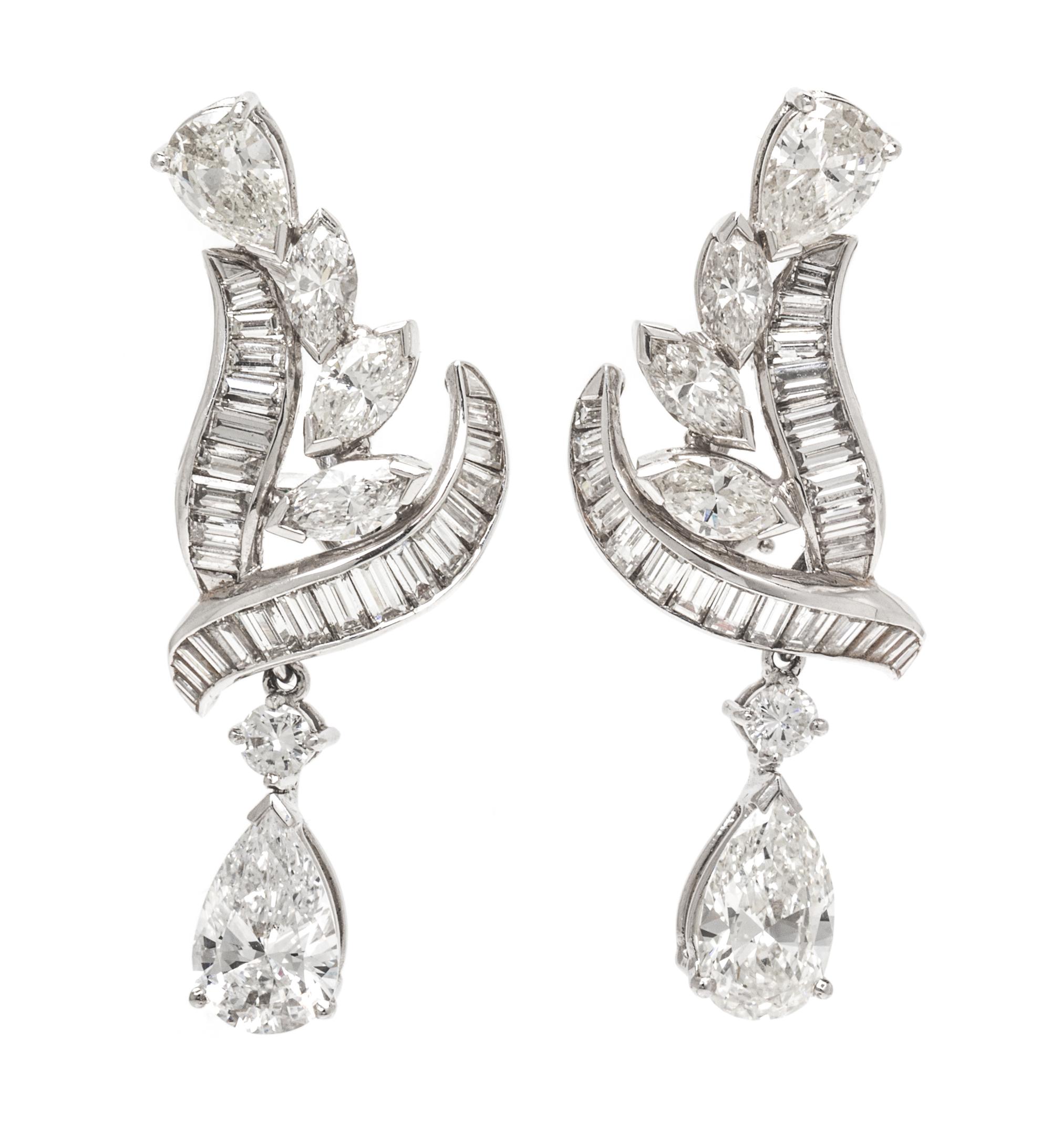 A Pair of Platinum and Diamond Convertible Day/Night Earclips, 9.00 dwts.