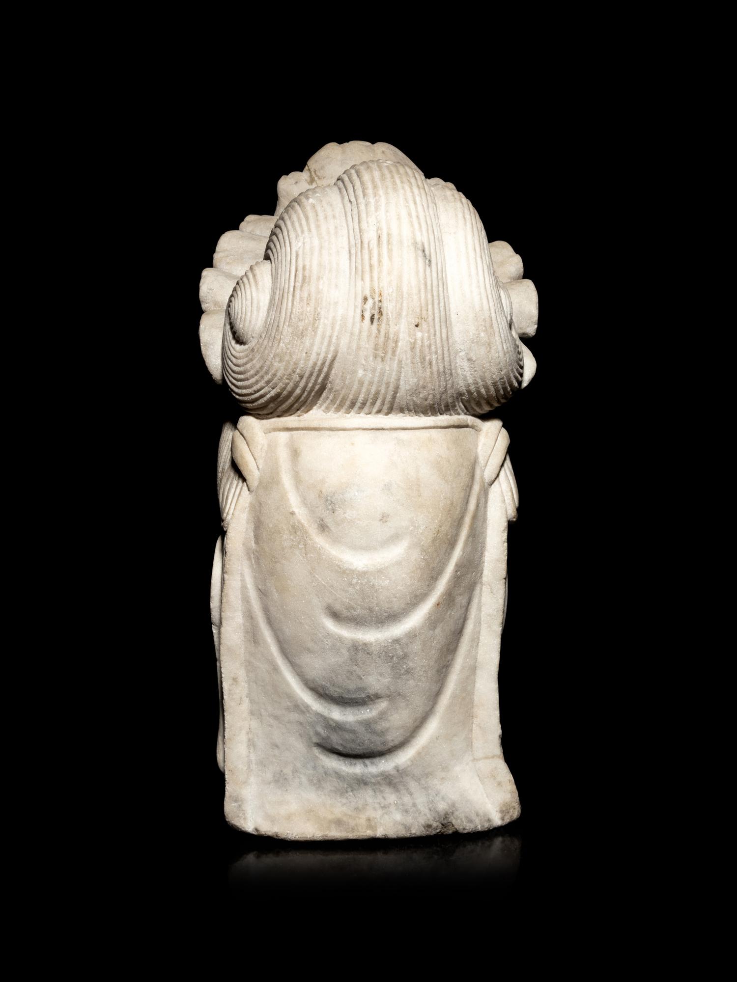 A Chinese White Marble Head of Guanyin