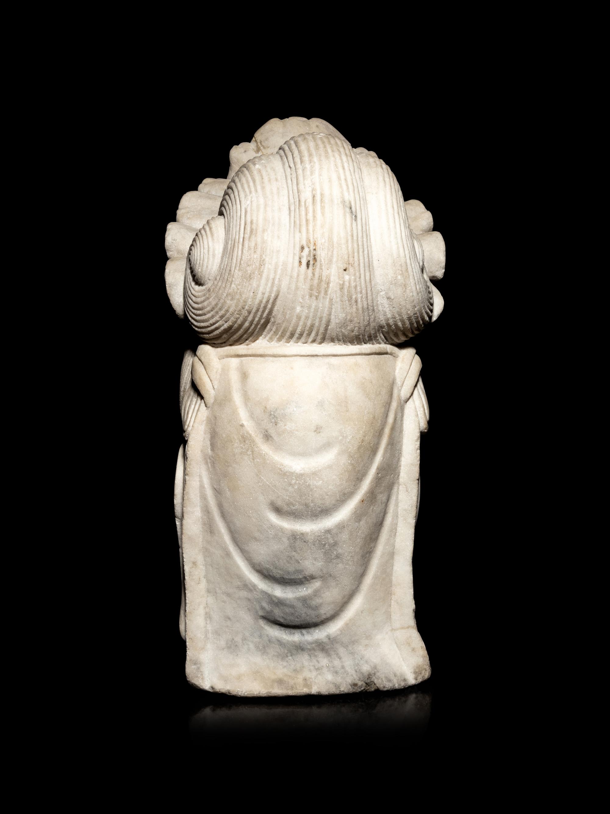 A Chinese White Marble Head of Guanyin
