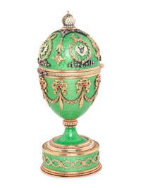 A Gold, Guilloché Enamel and Gemstone-Mounted Surprise Egg