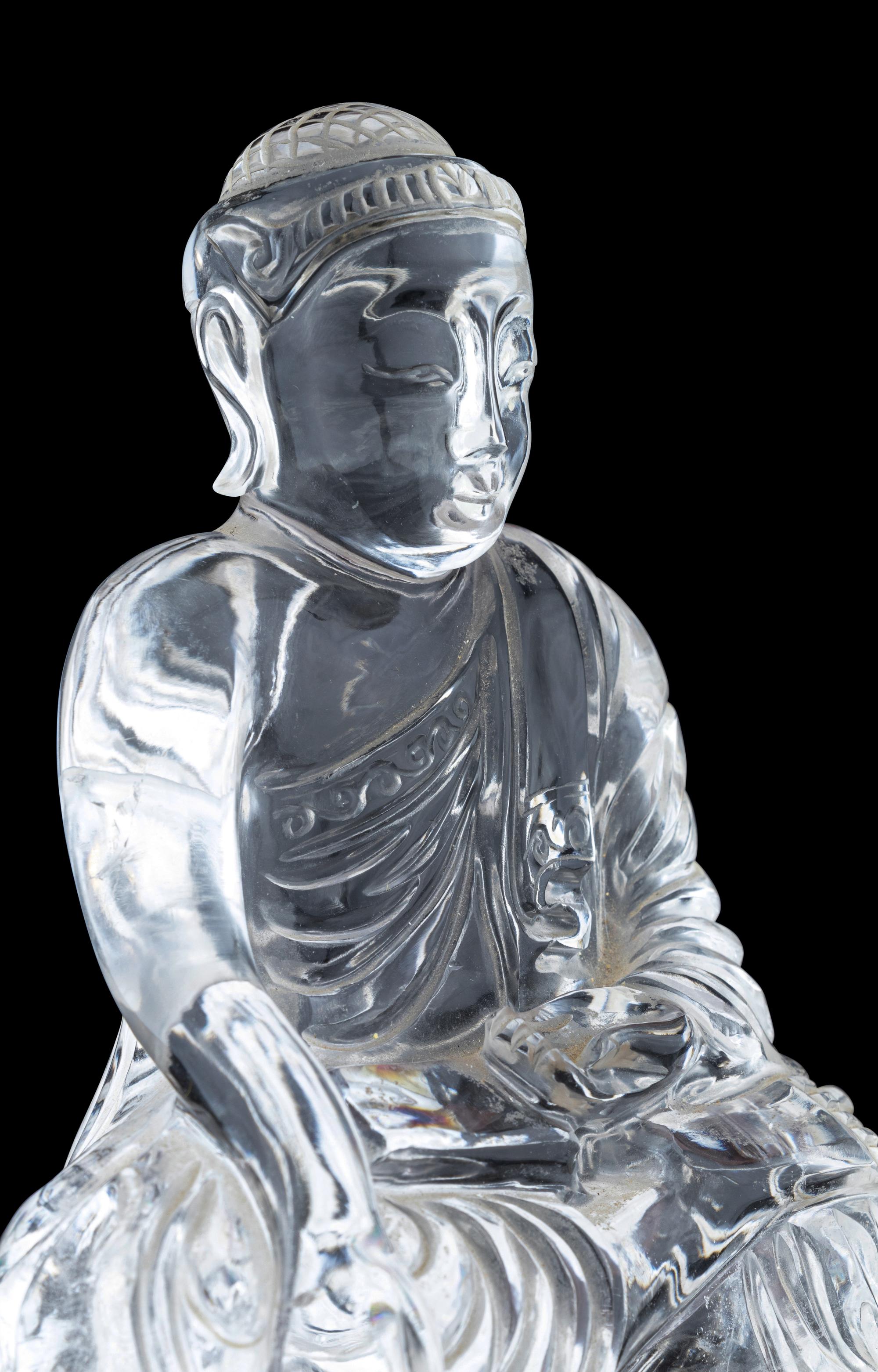 A Carved Rock Crystal Figure of Buddha