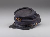 [CIVIL WAR]. 4th Rhode Island Infantry kepi identified to Captain Martin Page Buffum, POW at Petersburg. [ With :] ALLEN, George H. Forty-Six Months with the Fourth R.I. Volunteers.