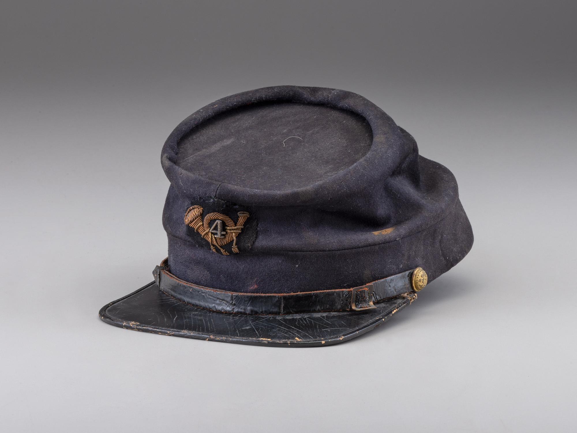 [CIVIL WAR]. 4th Rhode Island Infantry kepi identified to Captain Martin Page Buffum, POW at Petersburg. [ With :] ALLEN, George H. Forty-Six Months with the Fourth R.I. Volunteers.