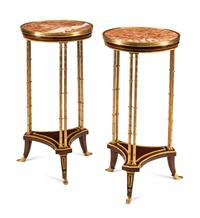 A Pair of French Gilt Bronze Mounted Mahogany Marble-Top Guéridons