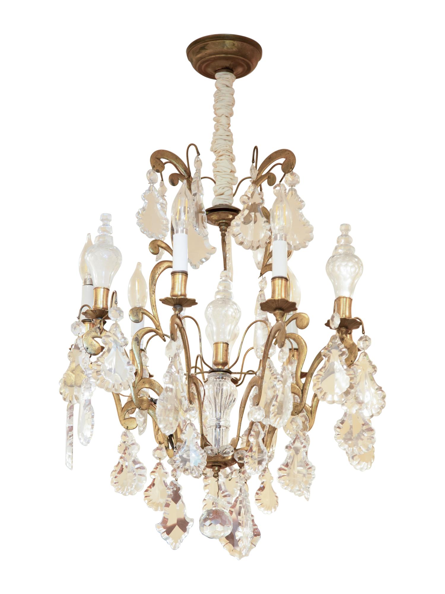 A French Gilt Bronze and Cut Glass Nine-Light Chandelier