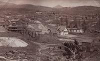 A group of four photographs (8098. Panorama of Denver; Untitled (roof tops of a town; Untitled (mining town); Georgetown)