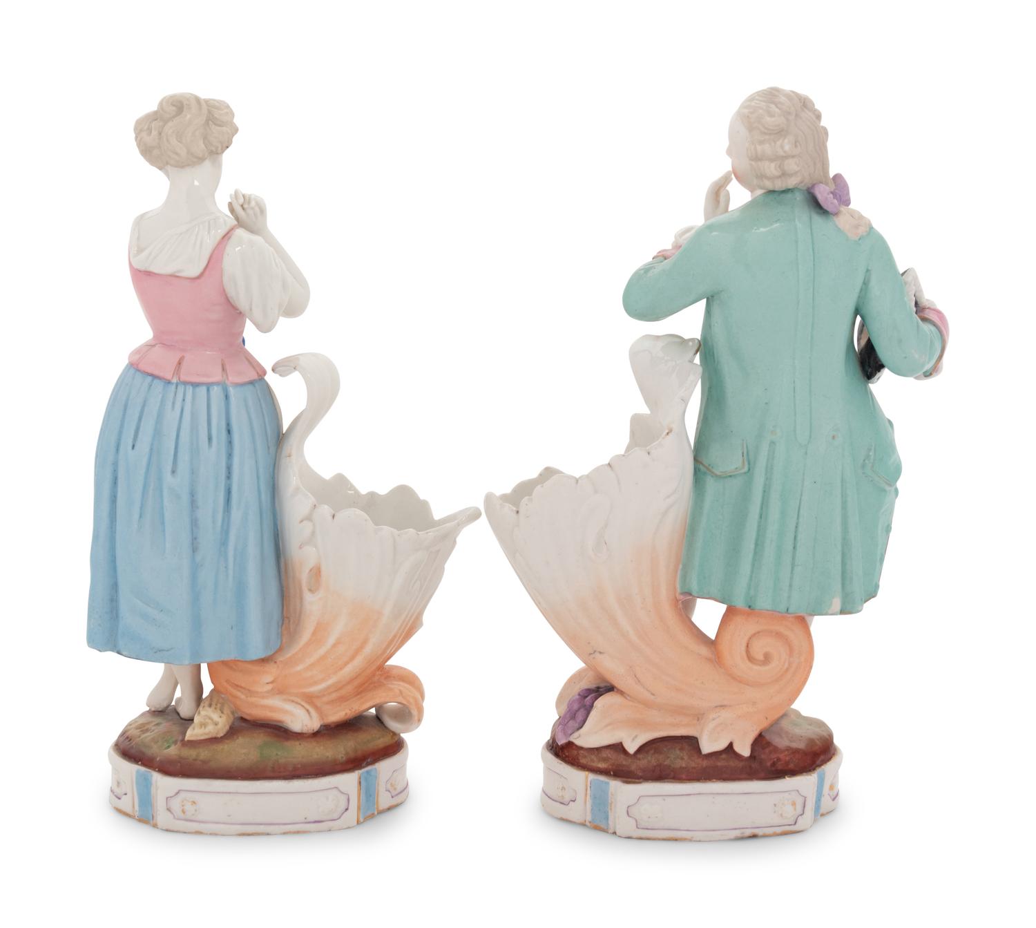 A Pair of Augustus Rex Porcelain Figural Vases
