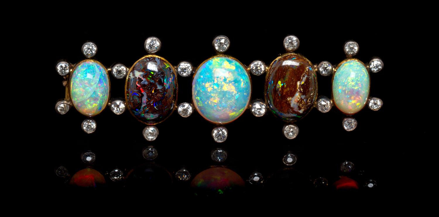 A Silver Topped Gold, Opal and Diamond Brooch, 8.40 dwts.