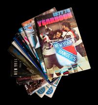A Group of 16 1960s - 1980s New York Rangers Blue Book Media Guides,