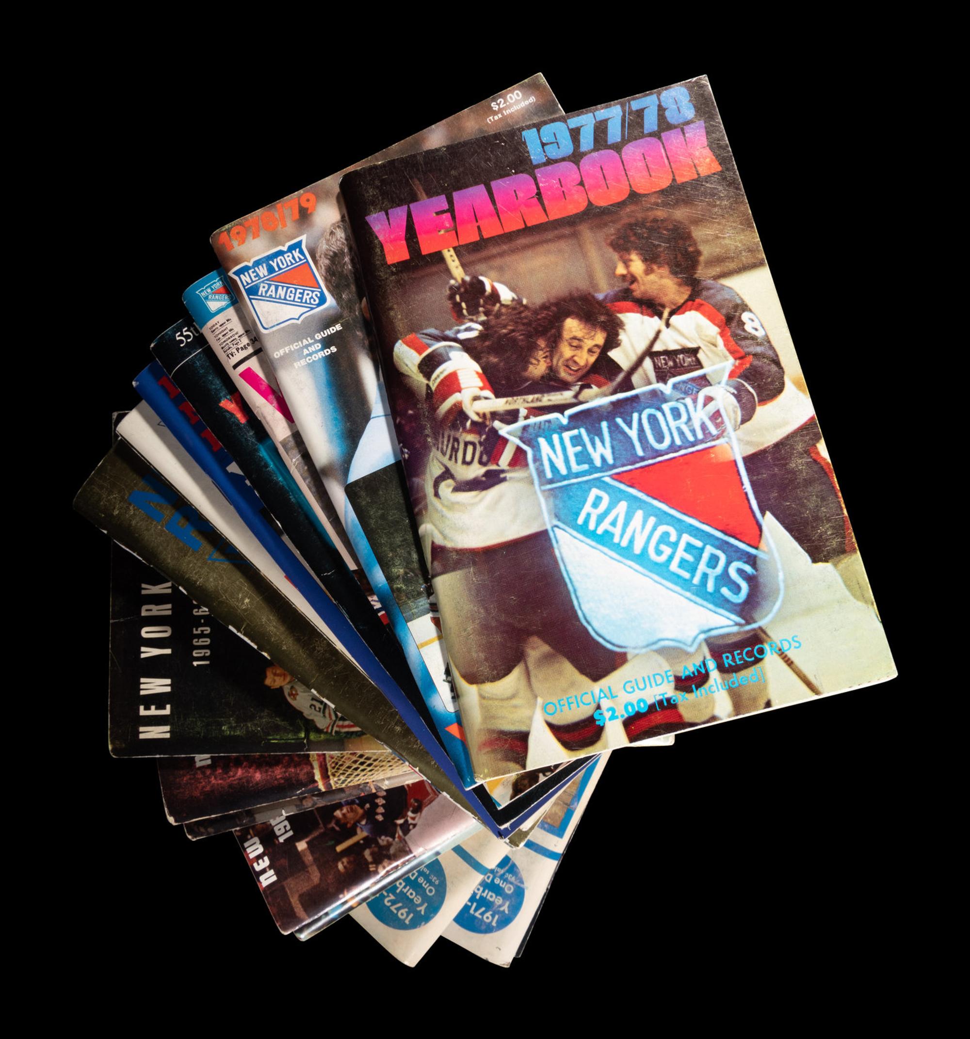 A Group of 16 1960s - 1980s New York Rangers Blue Book Media Guides,
