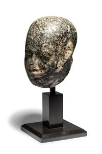 An Egyptian Stone Head of a Priest