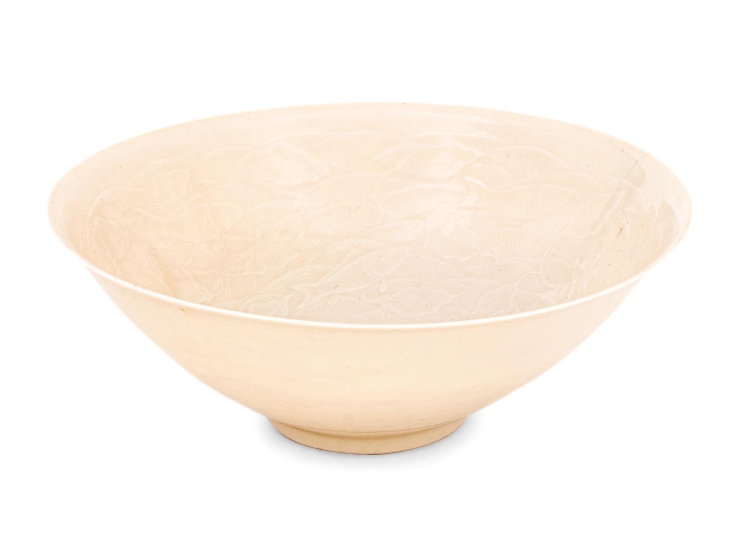 A Japanese White Glazed Molded Bowl