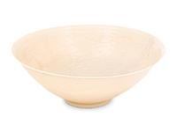 A Japanese White Glazed Molded Bowl
