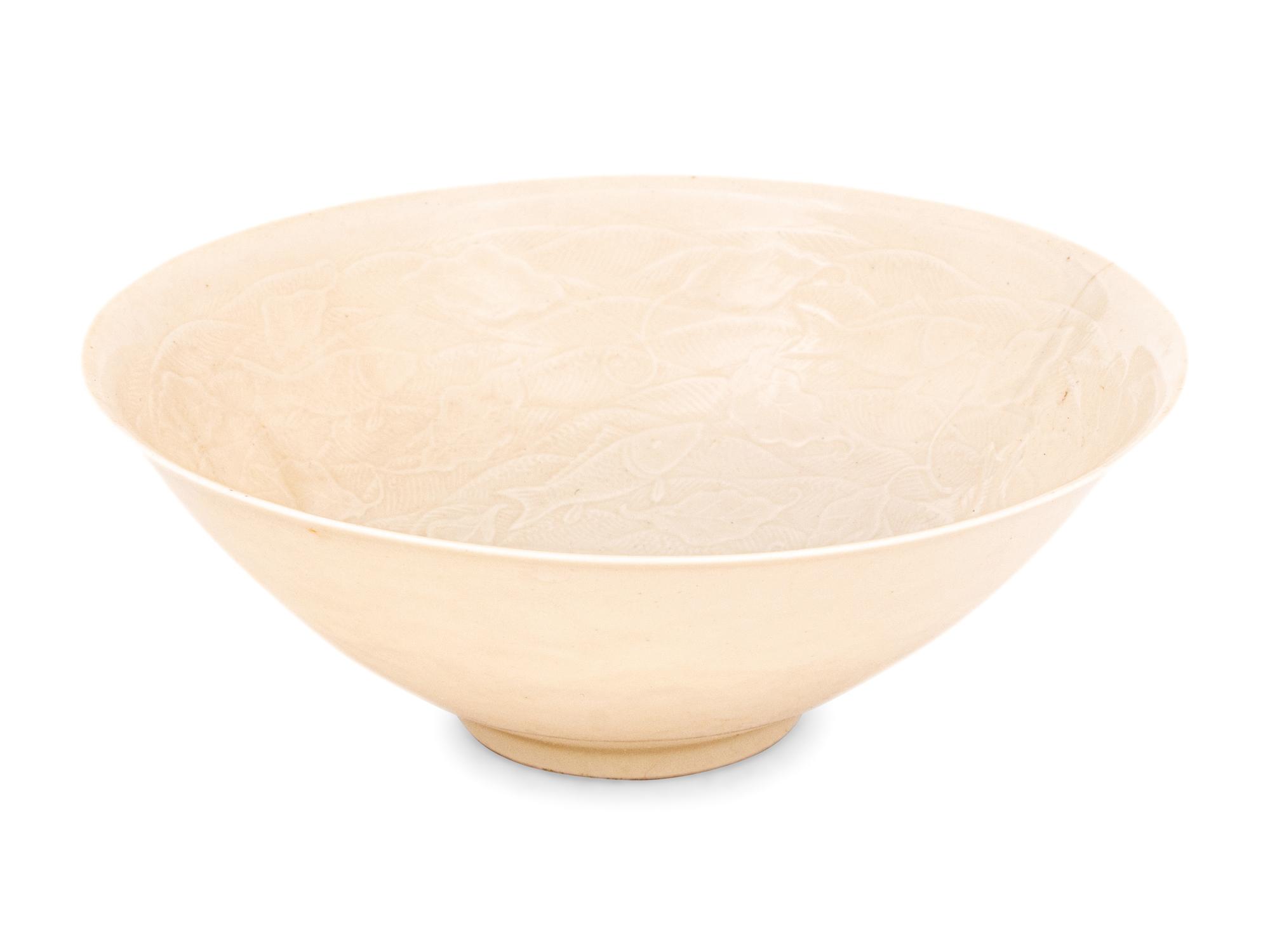 A Japanese White Glazed Molded Bowl