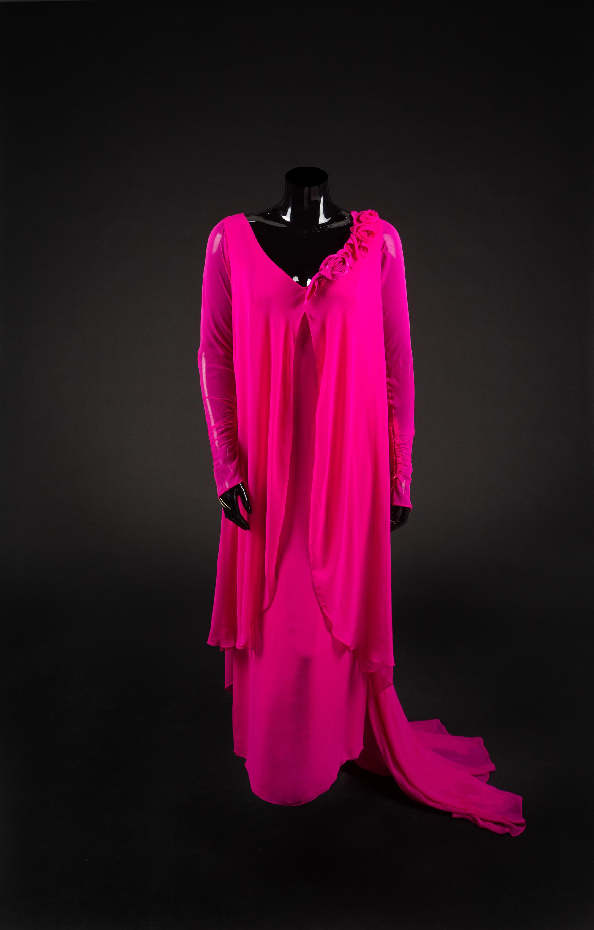 Dress, bag, necklace and earrings, 1989. Dress designed by Paul Zastupnevitch, made by Western Costume Company in Los Angeles. — Worn by Olivia de Havilland for the 15th People’s Choice Awards on March 12, 1989 to accept the People’s Choice Award for “Gone With the Wind” as the favorite film of all time.