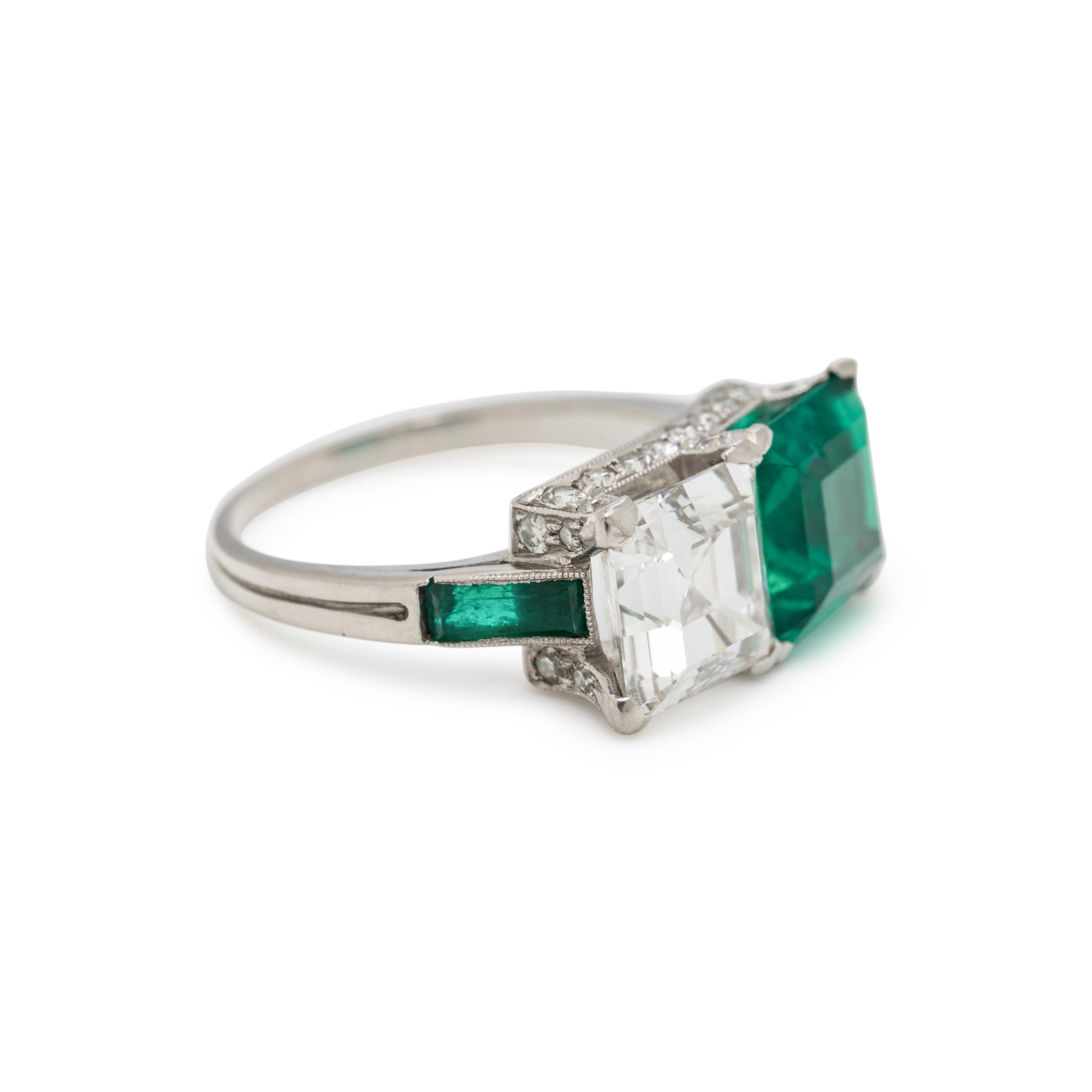 ART DECO, EMERALD AND DIAMOND 'TOI ET MOI' RING