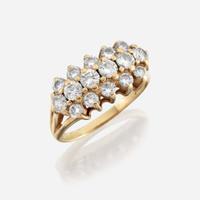 A diamond and fourteen karat gold ring