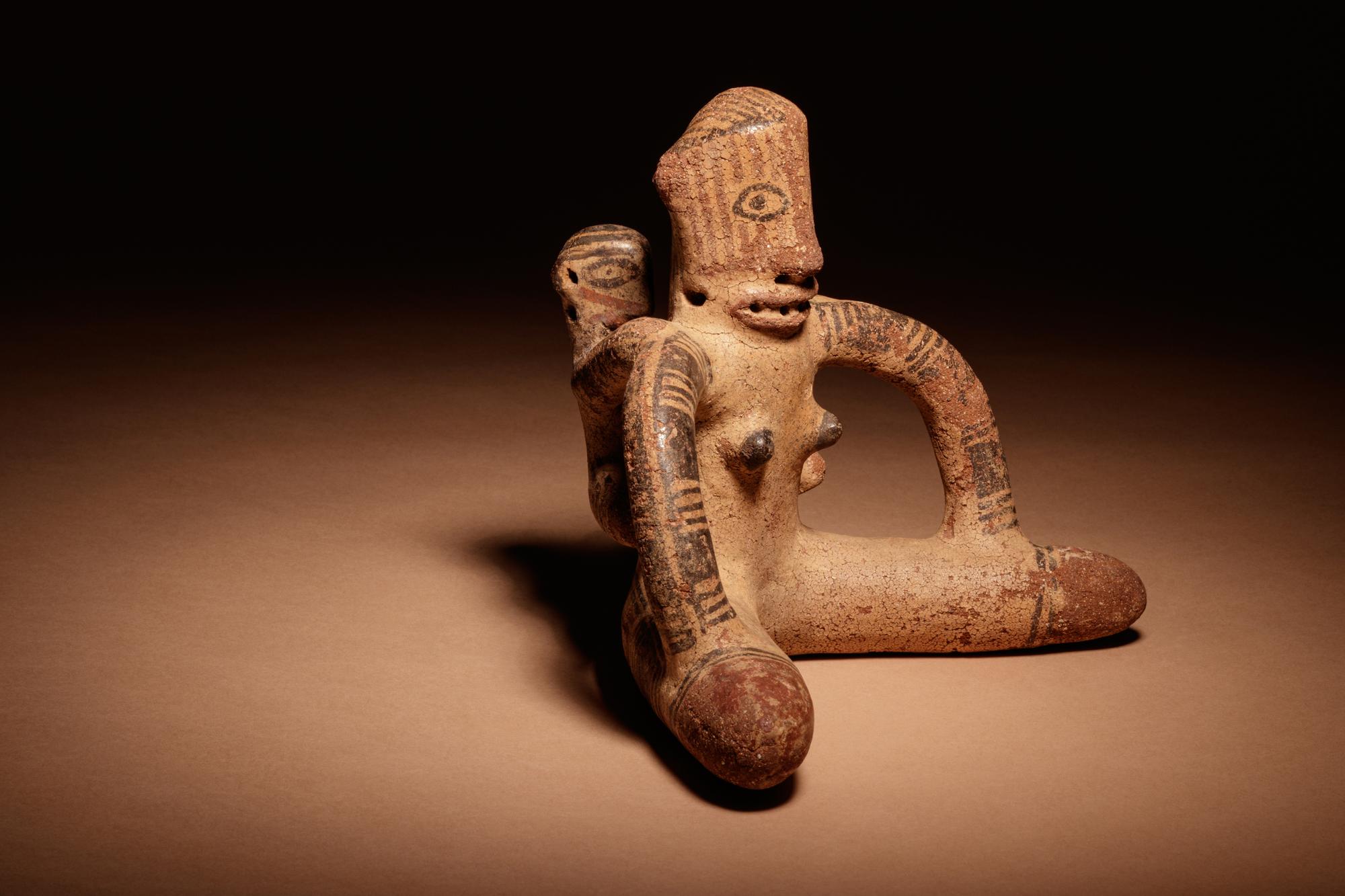 A Nicoya Polychrome Pottery Mother and Child