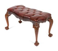 A George III Style Carved Mahogany Tufted-Leather Ottoman