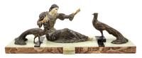 An Art Deco Cast Metal Composite Figure, Menneville Height 13 x width 34 3/4 x depth 8 3/4 inches.
