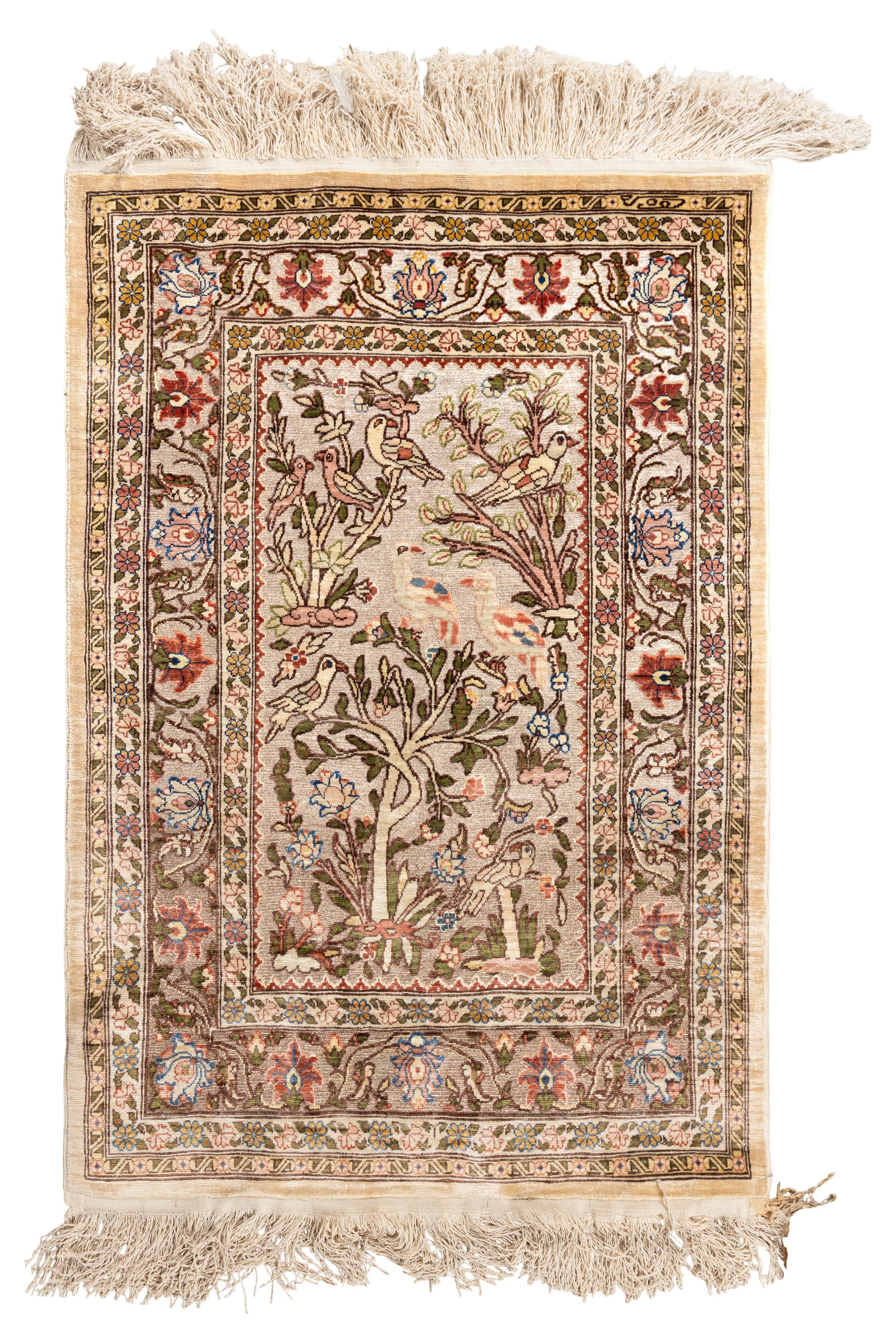 A Silk and Metallic Thread Rug
