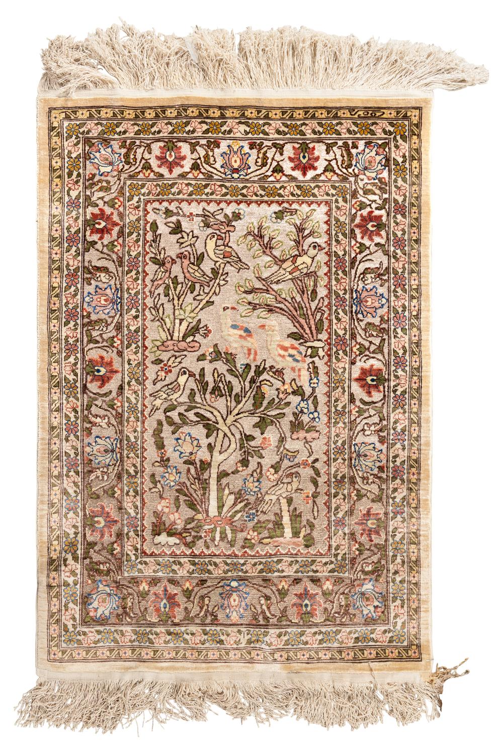 A Silk and Metallic Thread Rug