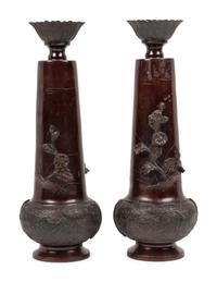 A Pair of Japanese Bronze Candlesticks