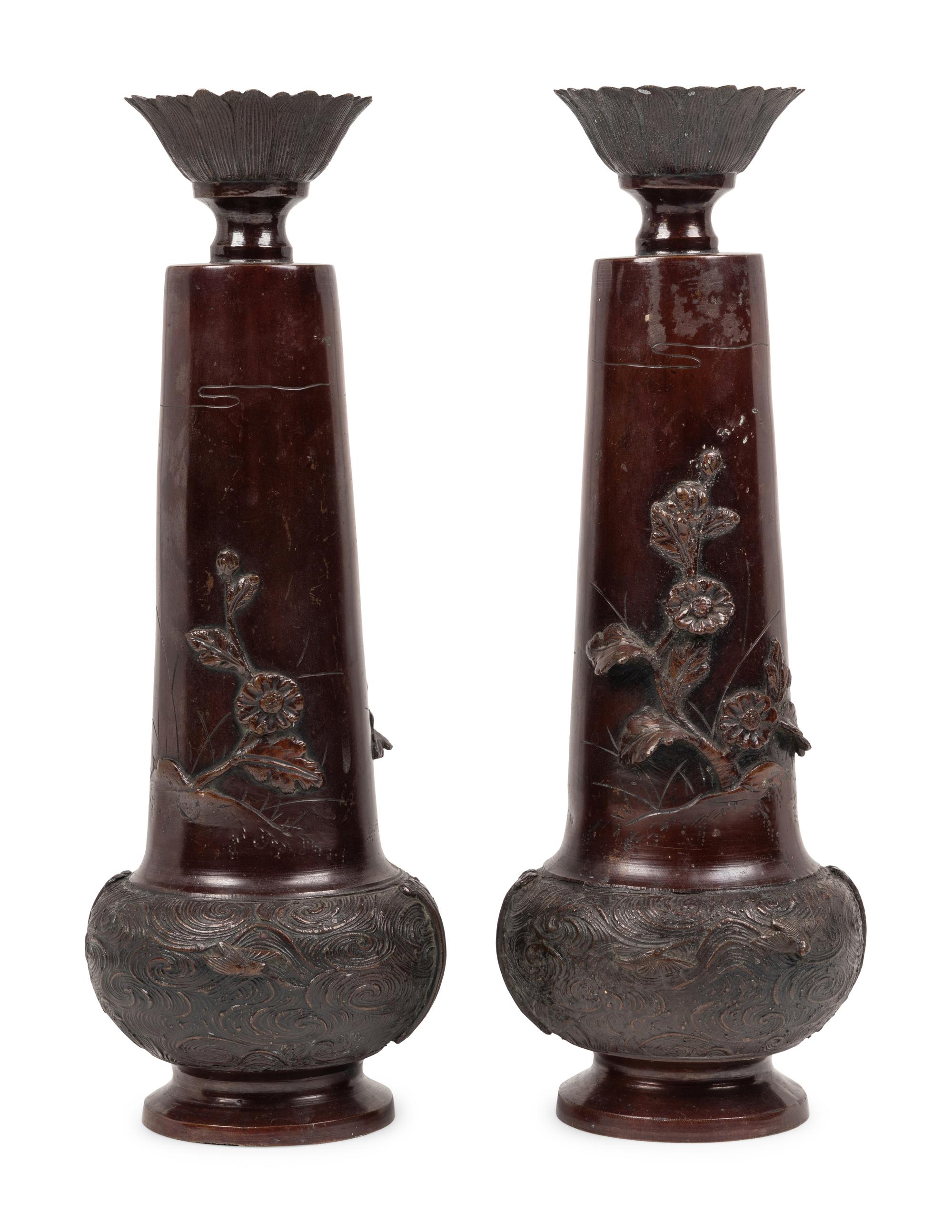 A Pair of Japanese Bronze Candlesticks