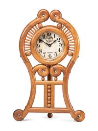A Stick and Ball Oak Mantel Clock