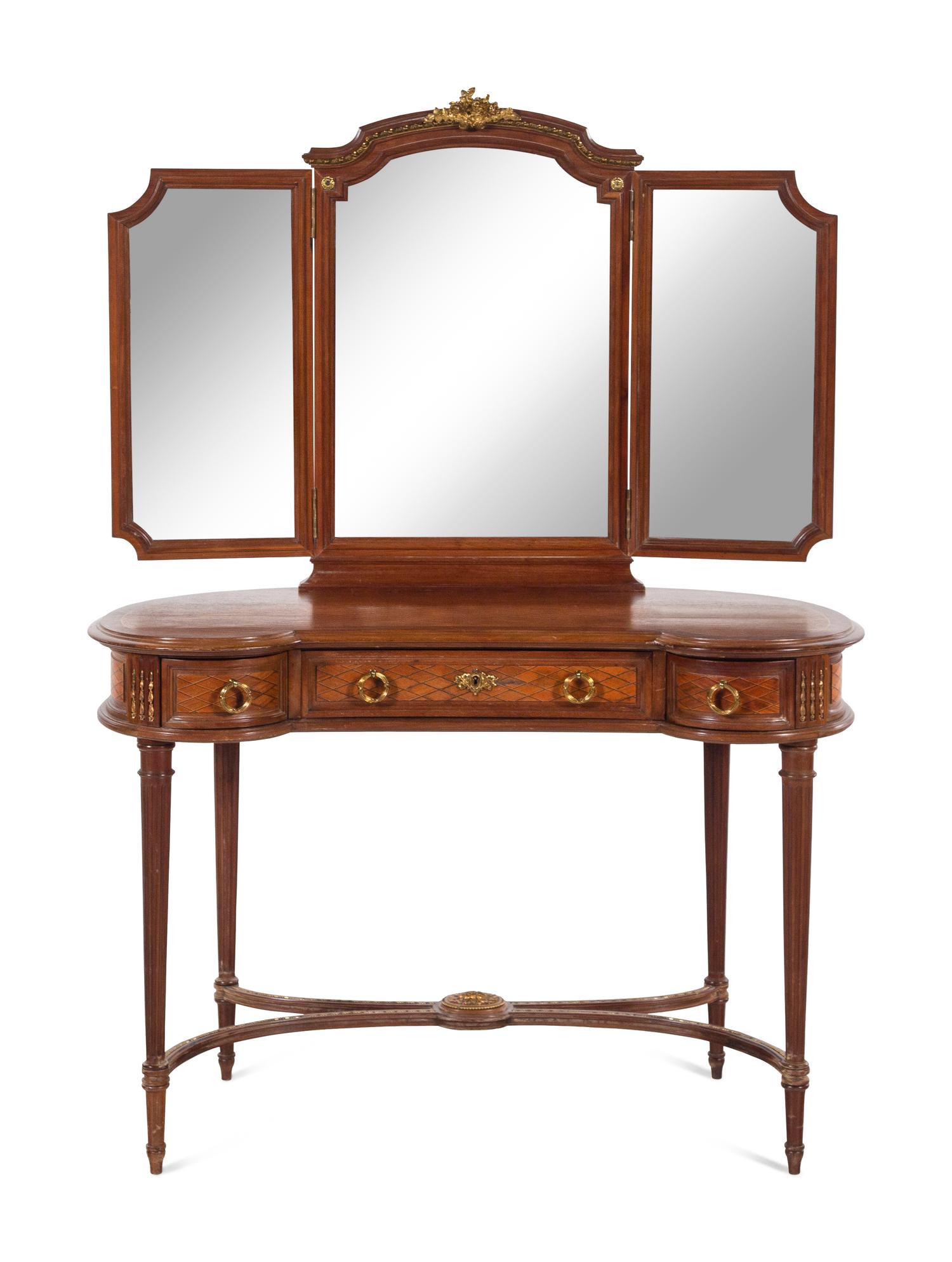 A Louis XVI Style Gilt Bronze Mounted Parquetry Decorated Dressing Table