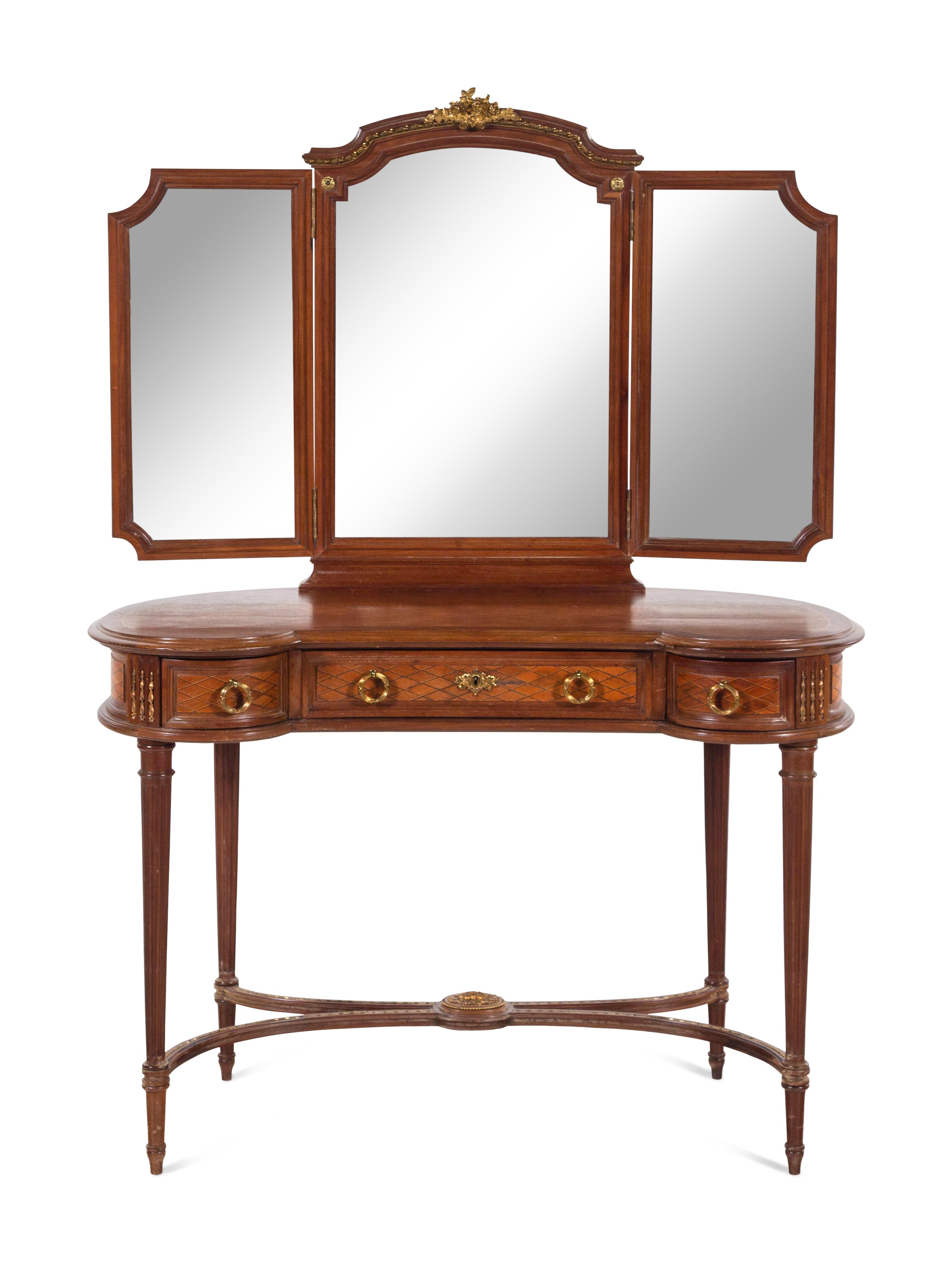 A Louis XVI Style Gilt Bronze Mounted Parquetry Decorated Dressing Table