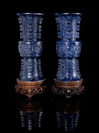 A Pair of Carved Hardstone Gu-Form Miniature Vases Height of each 4 inches.