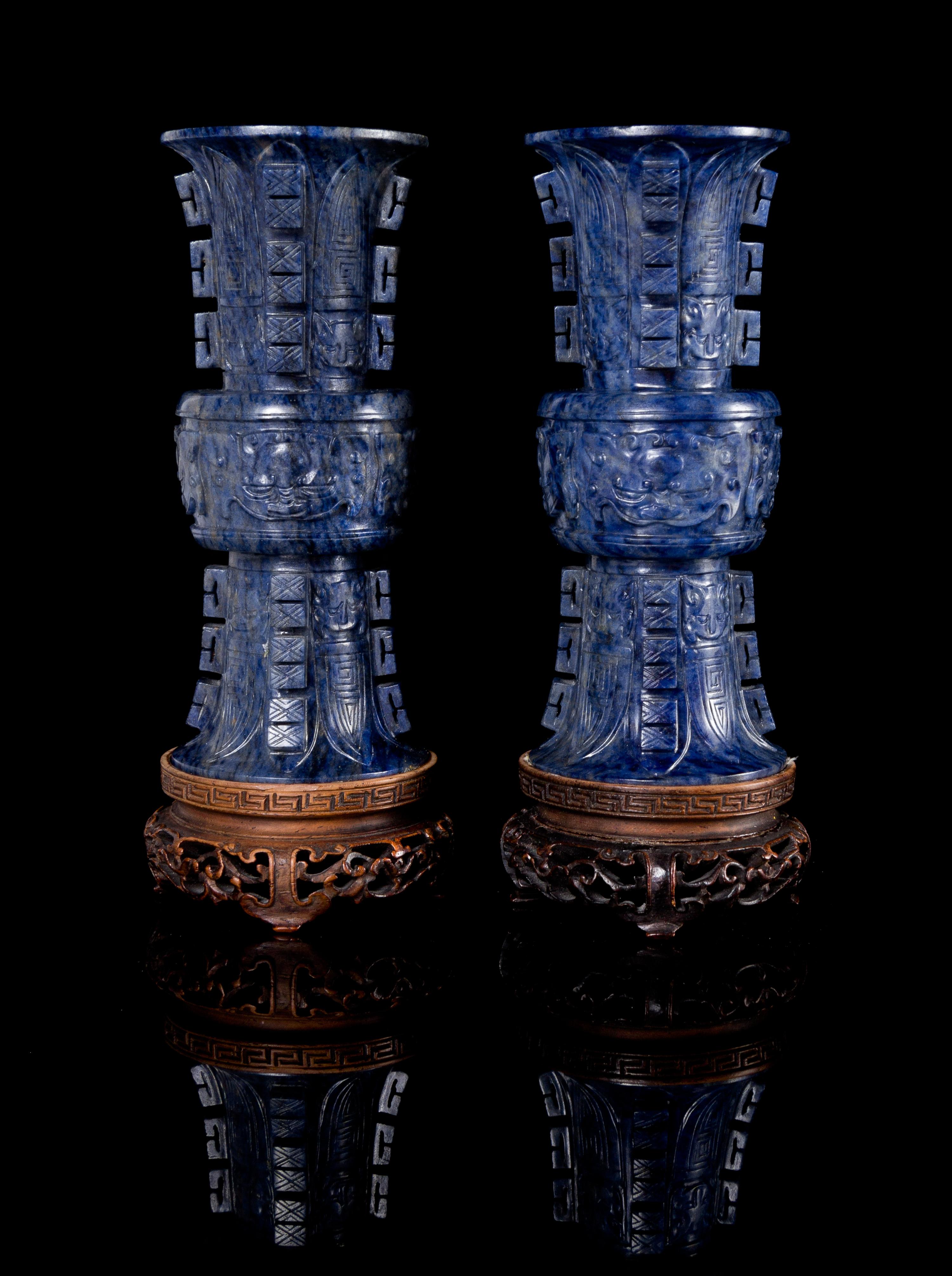 A Pair of Carved Hardstone Gu-Form Miniature Vases Height of each 4 inches.