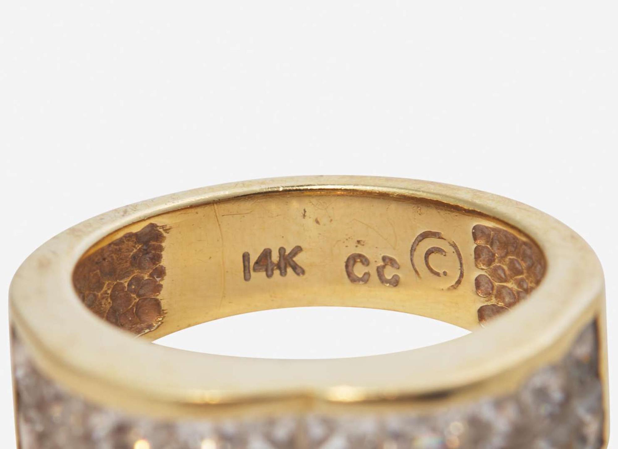 A Collection of Assorted Gold and Gemstone Rings